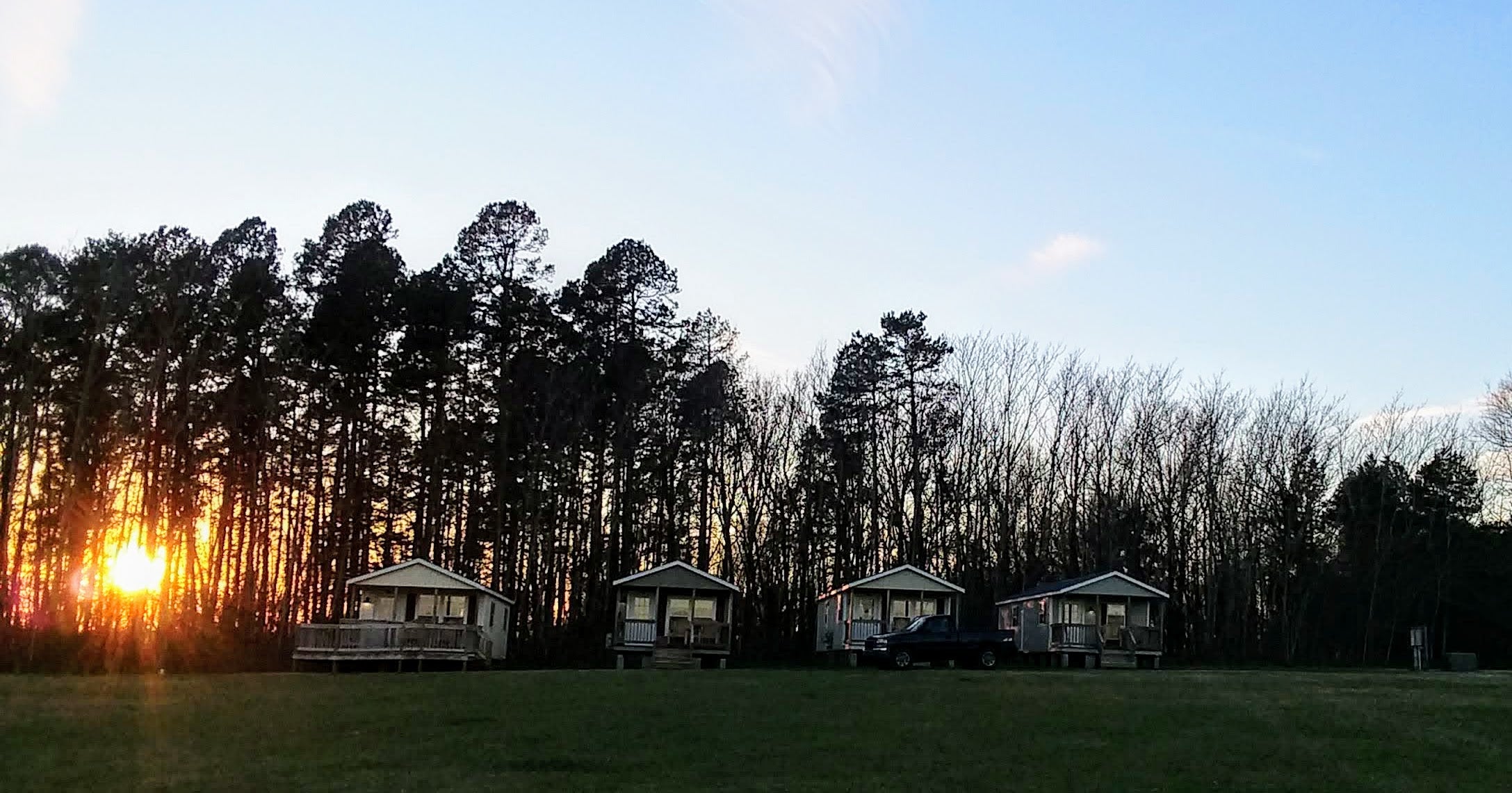TerraStay Farm-Stay Cabins at sunset