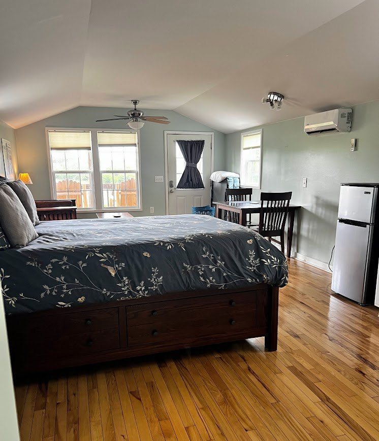 Cabin bedroom at TerraStay Farm-Stay Cabins